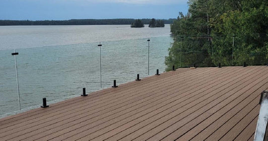 12 mm tempered glass guard rail installed on an outdoor deck with clear open views