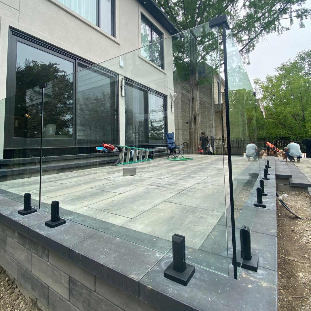glass railing panels used for safety and unobstructed view on balcony