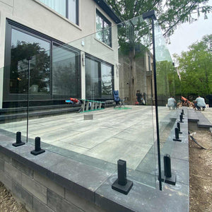 glass railing panels used for safety and unobstructed view on balcony