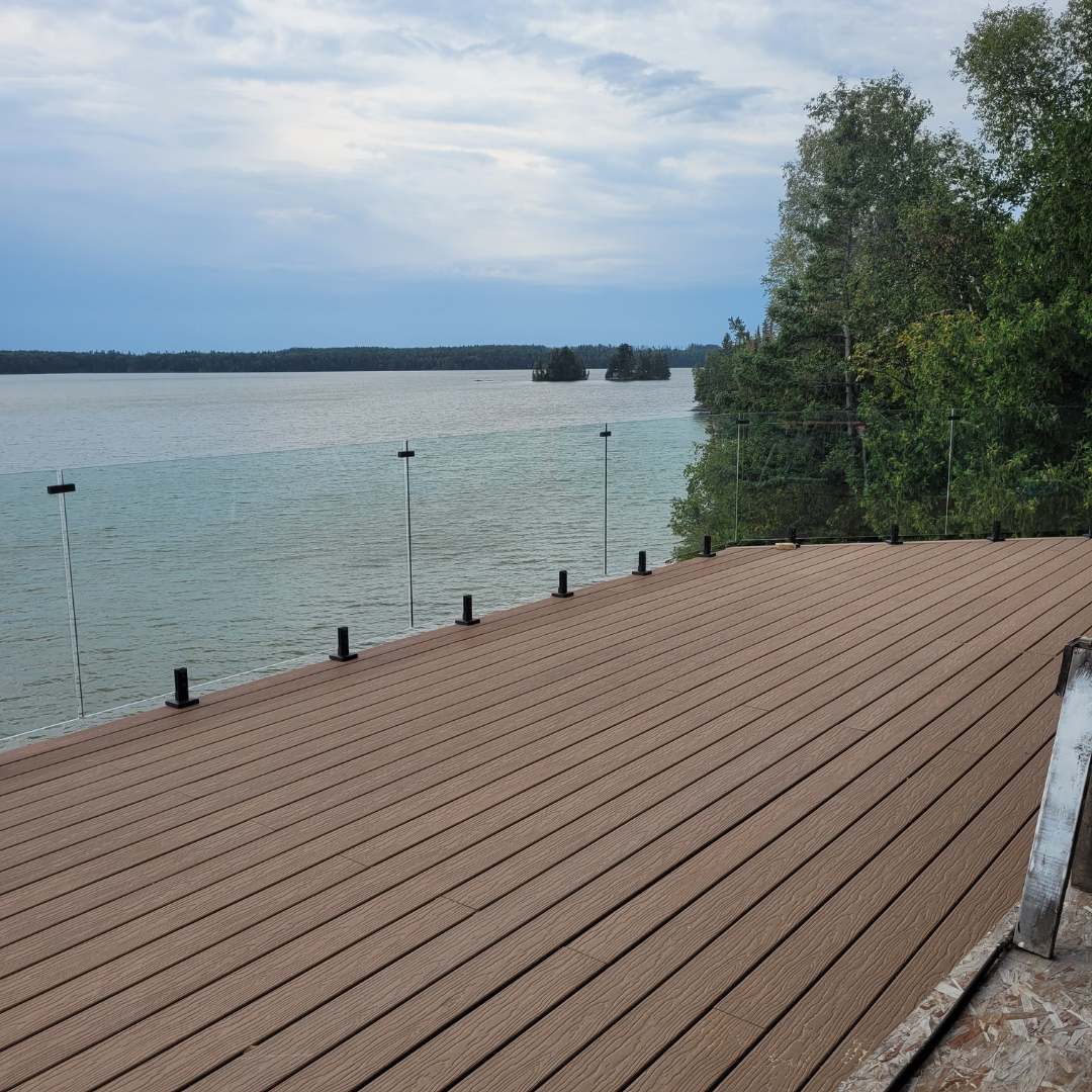 40 inch glass railing installation on deck overlooking lake in Canada