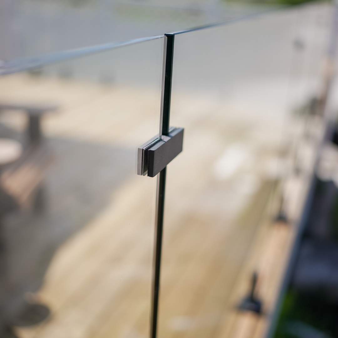 glass railing connector used to join panels for a secure and seamless installation