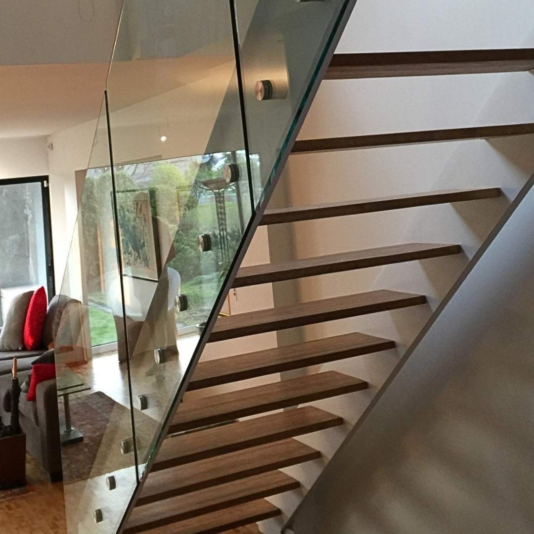 glass railing system used in modern interior space