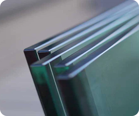 Contemporary balcony featuring clear glass railing panels