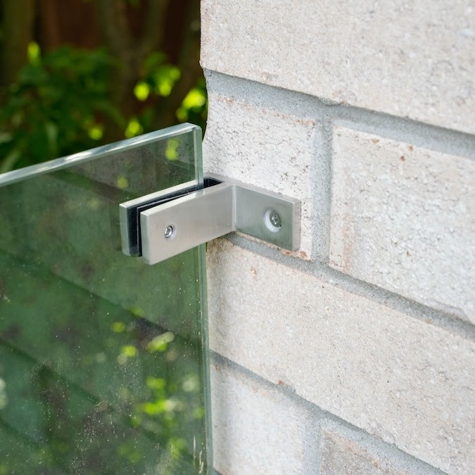 Brushed stainless wall-to-glass connector for